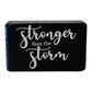 Stronger Than The Storm Black Sign